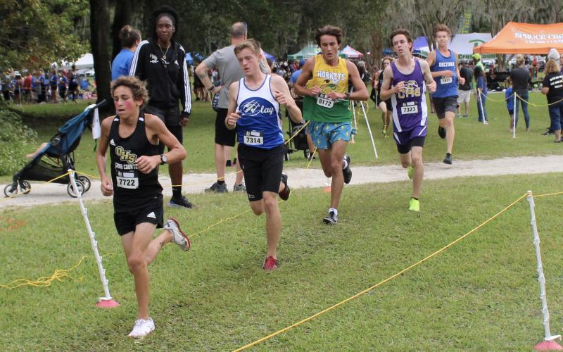 Columbia runner Nolan Martin (second from right) competes at the New World Fall Spectacular. (COURTESY)
