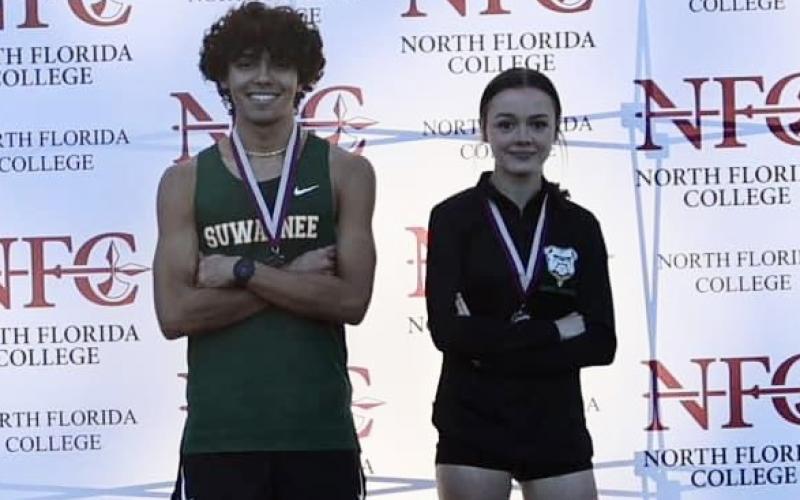 Suwannee runners Morgan Mobley (left) and Ryleigh Hermanson (right) set new school records at the North Florida Classic on Saturday. (COURTESY)