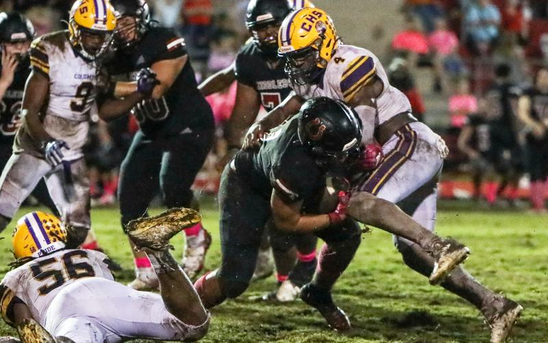 Columbia defensive end Au’vontae Smith makes a tackle against Middleburg on Friday. (BRENT KUYKENDALL/Lake City Reporter)