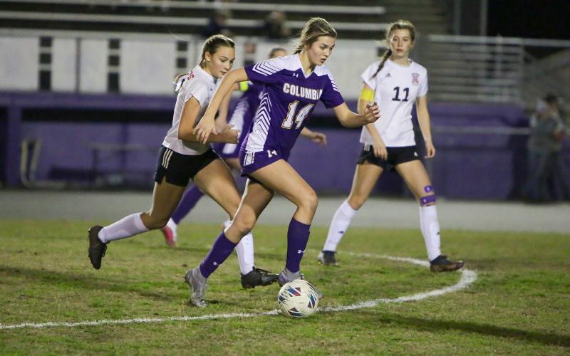 Columbia midfielder Mia Brasel dribbles up the field against Middleburg last season. (BRENT KUYKENDALL/Lake City Reporter)