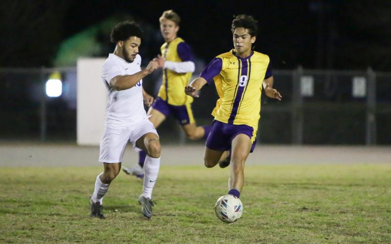 Columbia midfielder Bryson Kyi dribbles up the field against Palatka last season. (BRENT KUYKENDALL/Lake City Reporter)