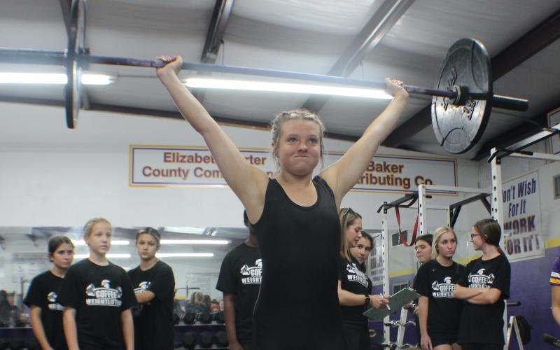 Columbia weightlifter Amber Millard completes her clean and jerk during Tuesday's meet. (COURTESY)