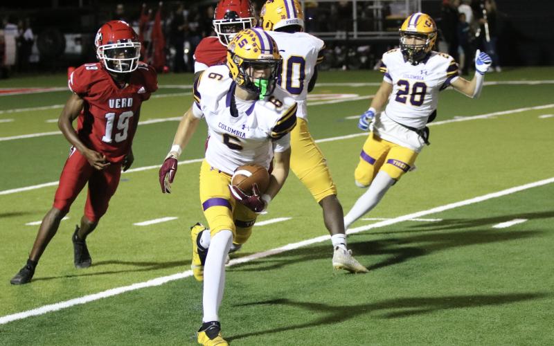 Columbia receiver Bynton Edge returns a kickoff against Vero Beach on Friday. (JORDAN KROEGER/Lake City Reporter)