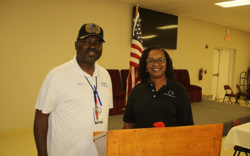 Shawn Raggins with the Florida Department of Veterans Affairs and Paulette Julien with Cooper’s Funeral Home spoke Saturday at a luncheon at Olivet Missionary Baptist Church about the importance of recognizing veterans and getting their their benefits and recognition. (TONY BRITT/Lake City Reporter)