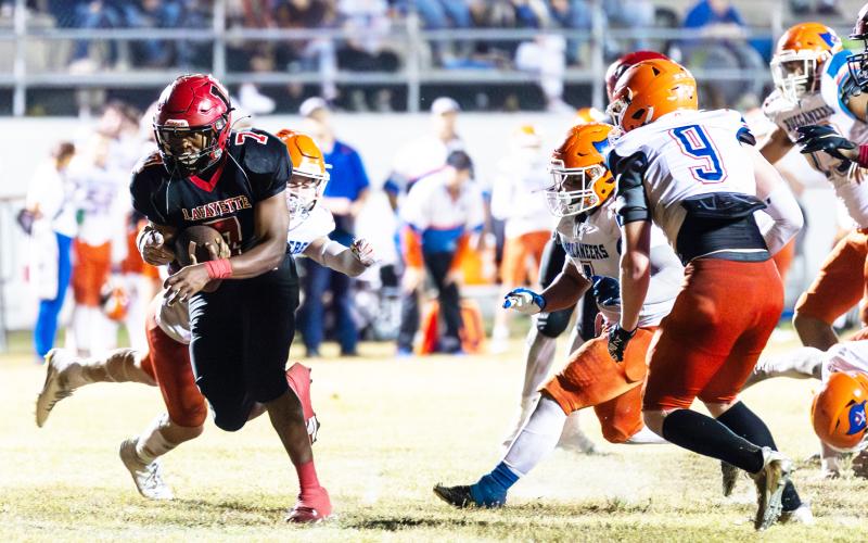 Lafayette running back Jay Ervin runs through the Branford defense during last Friday’s Region 3-1R quarterfinal. (JACK HOWDESHELL/Special to the Reporter)