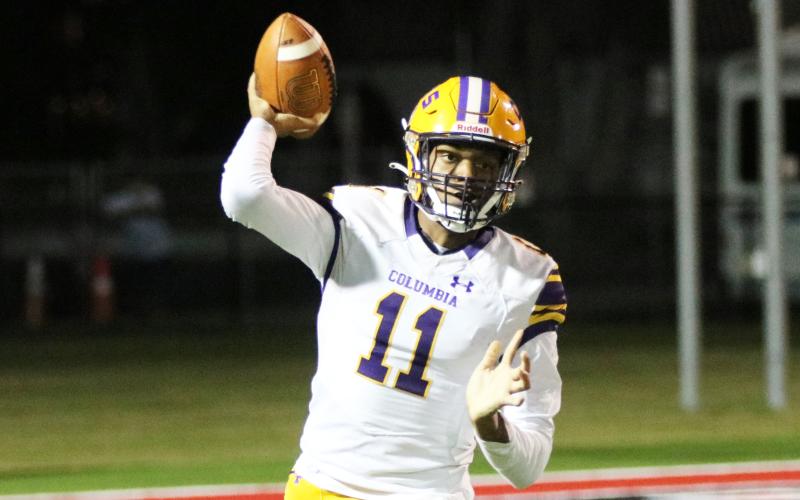 Columbia quarterback Zack Paulk throws a pass against Vero Beach last Friday. (JORDAN KROEGER/Lake City Reporter)