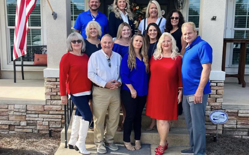 Staff at Brannon Real Estate will help host the annual veterans dinner on Nov. 11 at the Columbia Gateway Fairgrounds. Pictured here are Gail March-Baker (bottom row, from left), Jack Russell, Elicia Linton, Teresa Brannon, and Duke Silvey; Bonice Phinney (second row, from left), Callie Harrington, and Mindy Tenneboe; Michael Morrison (third row, from left), Leila Harrington and Tammy Tyre. Not pictured: Christian Griffis, Pamela Nettles, Amy Overstreet and Michale Cuadras. (COURTESY)