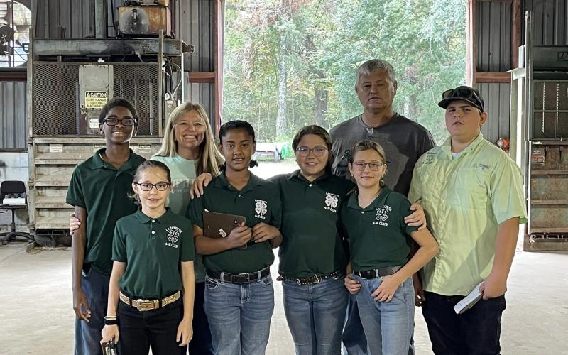 Lafayette County 4-H members that took place in the annual farm judging contest on Oct. 27 include Jaxon Murphy (from left), Lanae Colson, Jayda Hendrick, Lydia Lyons, Tinley Jackson and Justin Swinson Jr. Lafayette County Agriculture and Natural Resources Extension Agent Emily Beach and Lafayette County Extension Director Shawn Jackson are also pictured. (COURTESY)
