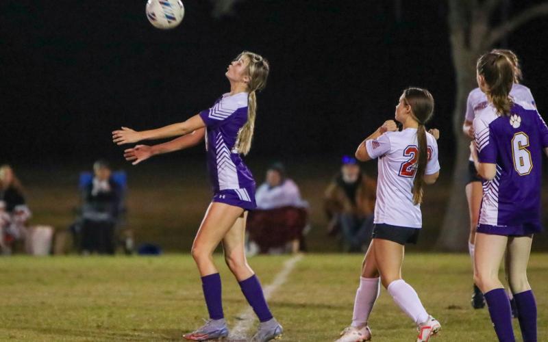 Columbia's Mia Brasel possesses the ball against Fort White on Thursday night. (BRENT KUYKENDALL/Lake City Reporter)