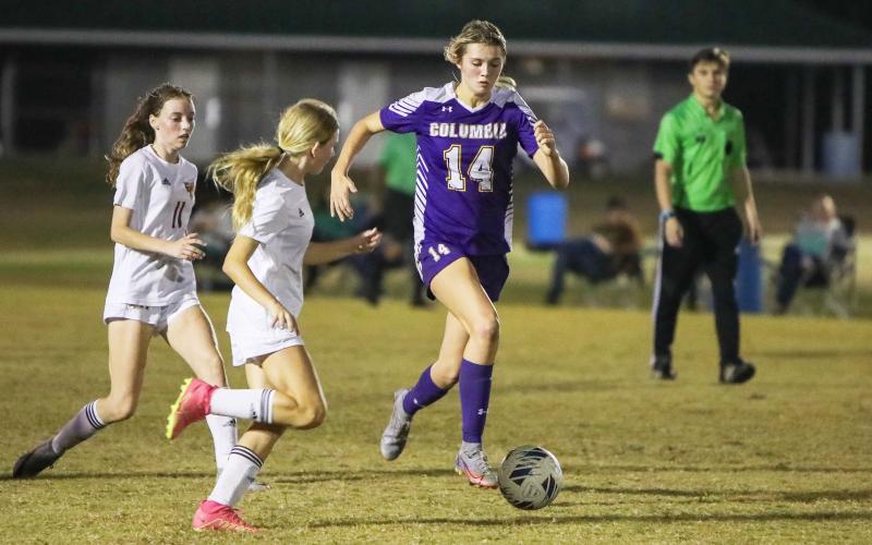 Columbia's Mia Brasel dribbles up the field against Florida High on Dec. 1. (BRENT KUYKENDALL/Lake City Reporter)