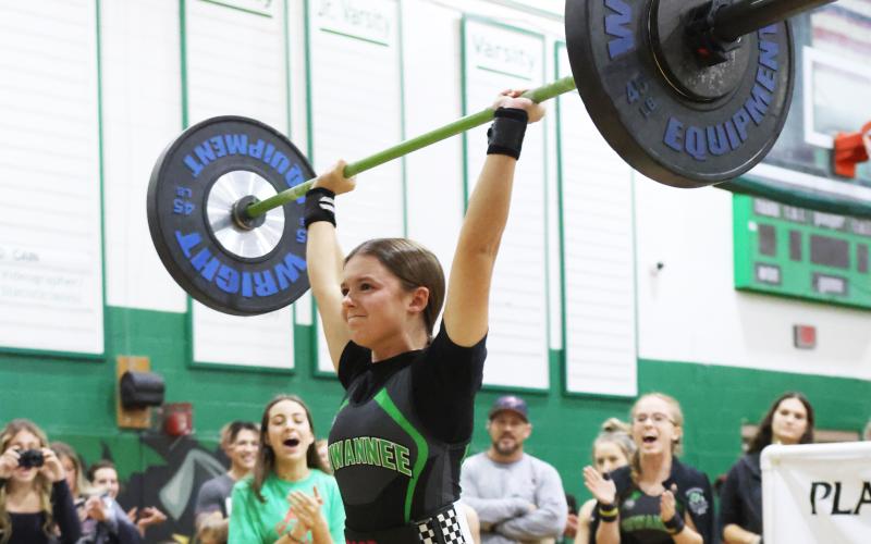 Suwannee’s Jordyn Rodriguez performs the clean and jerk during last season’s Power of Christmas meet. (FILE)