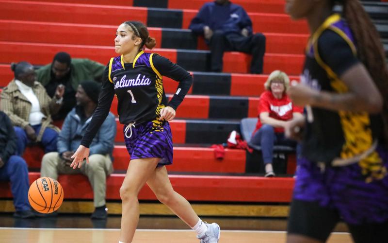 Columbia guard Mariah Cox dribbles up the court against Fort White on Jan. 16. (BRENT KUYKENDALL/Lake City Reporter)
