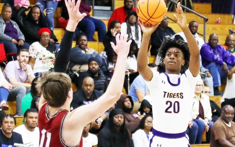 Columbia guard Murkail Cray shoots against Lowndes on Jan. 23. (BRENT KUYKENDALL/Lake City Reporter)