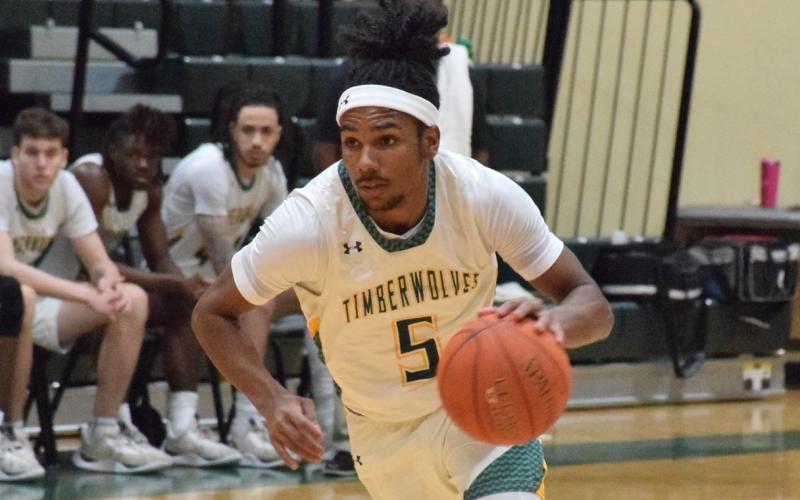 FGC guard Amayoa'ah Phillips dribbles up the court against Palm Beach State on Wednesday. (COURTESY OF FGC)
