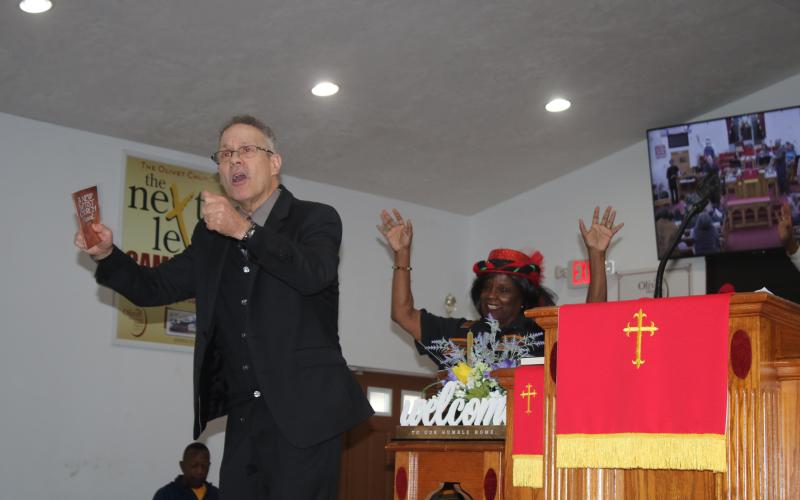 Henry Ortiz, pastor of Olivet Missionary Baptist, addresses the audience as the keynote speaker for the MLK Memorial Service on Monday afternoon. (TONY BRITT/Lake City Reporter)
