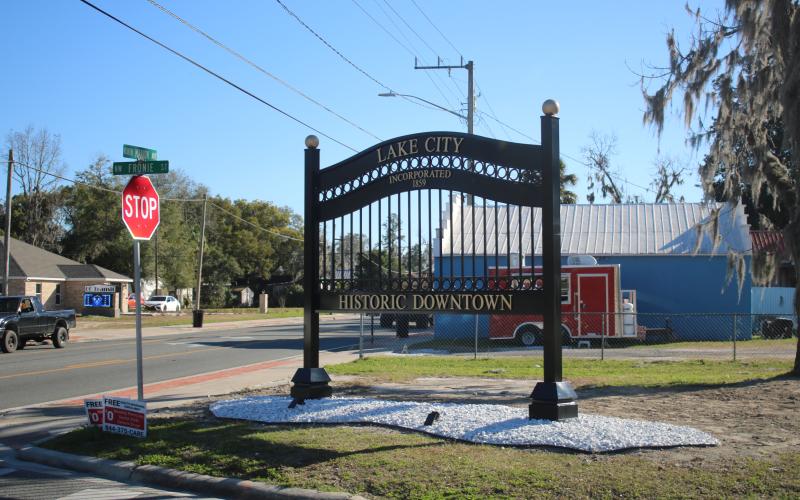 The historic downtown Lake City gate was recently re-erected at the intersection of North Marion Avenue and NW Fronie Street. (TONY BRITT/Lake City Reporter)
