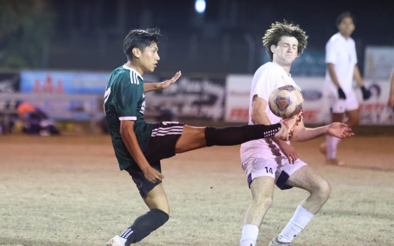 Suwannee's Joel De la Cruz controls possession of the ball against Columbia on Jan. 15. (PAUL BUCHANAN/Special to the Reporter)