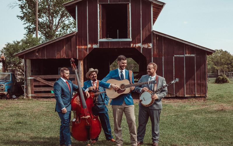 The Flattlanders, which includes Lake City’s Brian Andrews (second from right), Matt Melton (from left), Joey Lazio and Andy Kennan, placed fourth in the Society for the Preservation of Bluegrass Music in America national band competition this past weekend in Nashville. (COURTESY)
