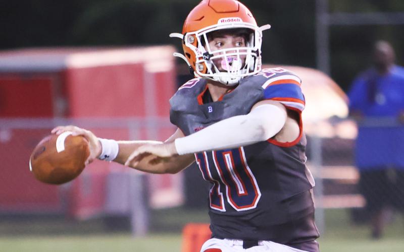 Branford quarterback Thomas Sikes throws a pass during the preseason jamboree last season. (PAUL BUCHANAN/Special to the Reporter)