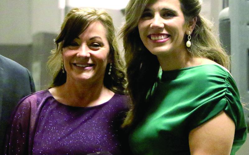 Suwannee Springcrest Elementary teacher Theda Roper (left) was named the Suwannee County Teacher of the Year on Thursday. Roper received her award from the district’s 2023 Teacher of the Year Emily Murphy. (MORGAN MCMULLEN/Lake City Reporter)