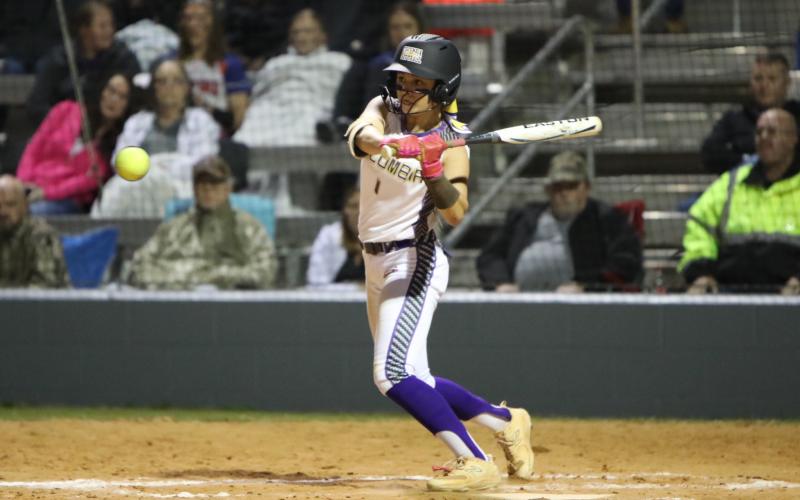 Columbia shortstop Lillyenne Mayhew eyes a pitch at the plate against Branford on Feb. 22. (BRENT KUYKENDALL/Lake City Reporter)