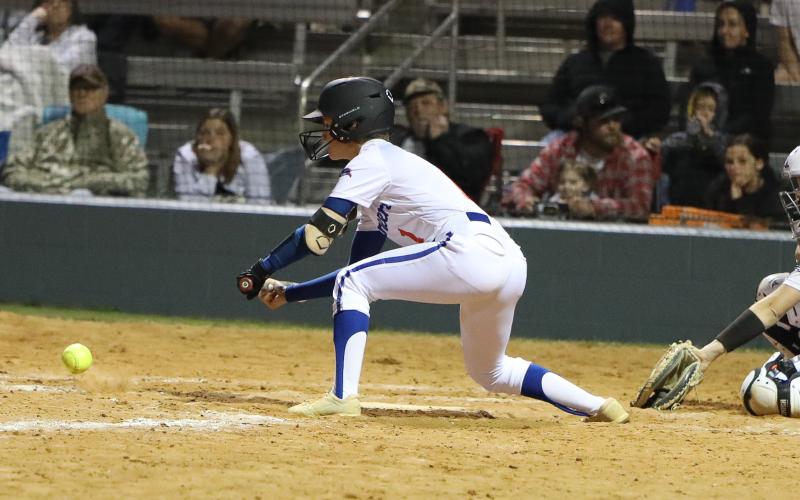 Branford second baseman Payten Bates tries to lay down a bunt against Columbia on Thursday night. (BRENT KUYKENDALL/Lake City Reporter)