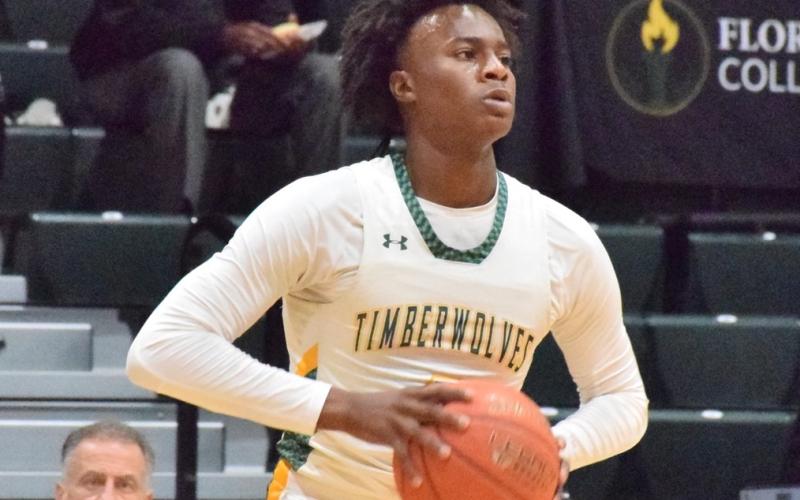 FGC forward Ty'jahn Wright looks to pass against Palm Beach State College on Jan. 17. (COURTESY OF FGC)