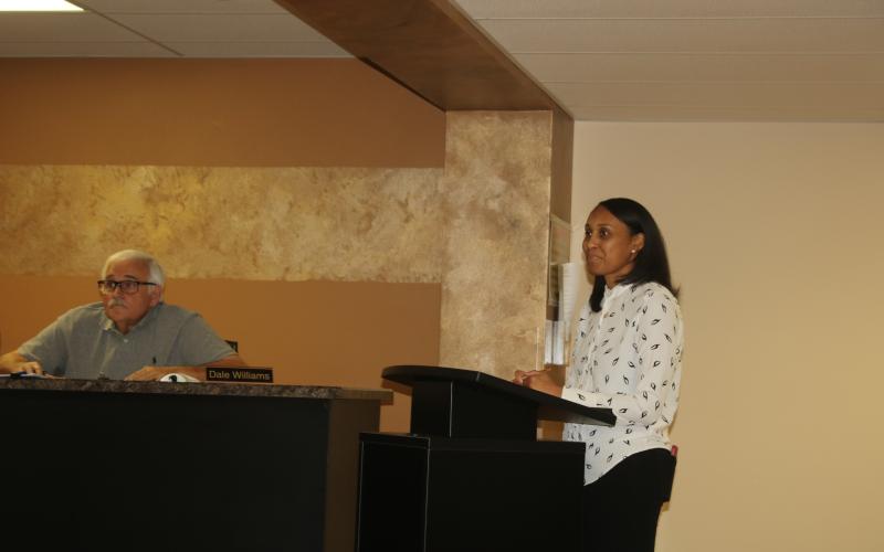 Erica Mayo presents her plan for the Mayo Pharmacy and Wellness Center to the Lake Shore Hospital Authority board Monday night. (TONY BRITT/Lake City Reporter)