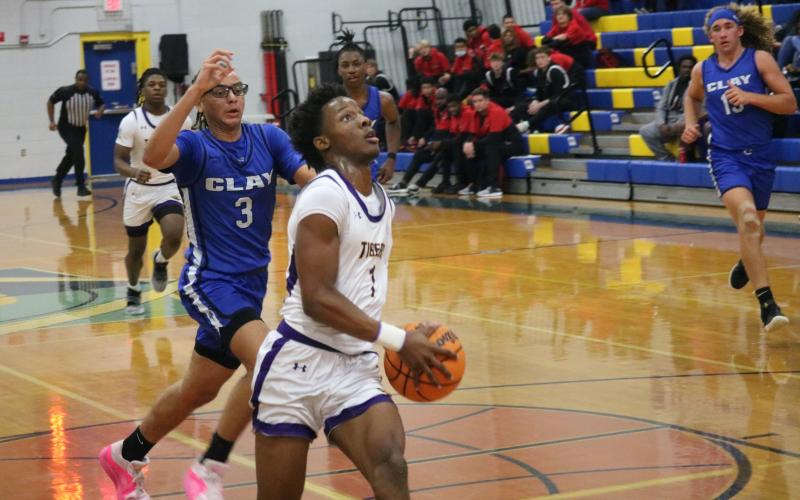 Columbia guard Marlin Haywood goes up for a layup on a fast break during Thursday's District 2-5A semifinal against Clay. (JORDAN KROEGER/Lake City Reporter)