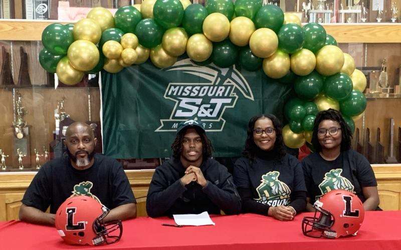 Lafayette's Jalen Hill signed his letter of intent to play at Missouri S&amp;T on Wednesday. (COURTESY)
