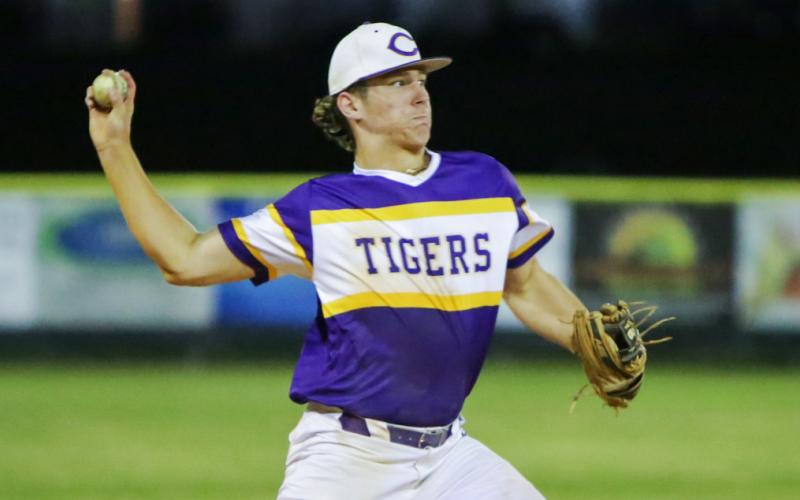 Columbia third baseman Ayden Phillips throws to first base against Chiles last season. (BRENT KUYKENDALL/Lake City Reporter)