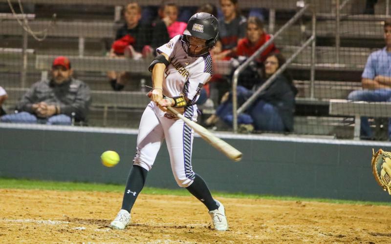 Columbia outfielder Luisa Taylor swings at a pitch against University Christian on March 8. (BRENT KUYKENDALL/Lake City Reporter)