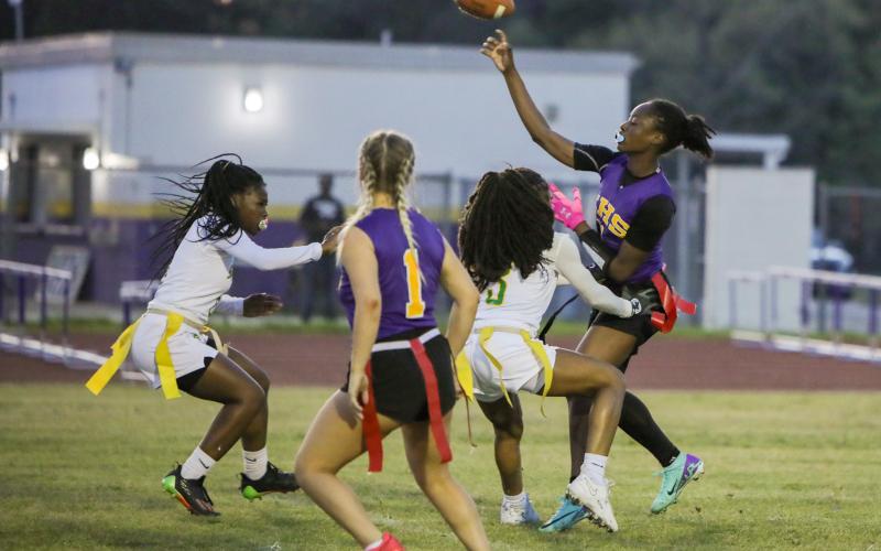 Columbia quarterback Eriel Baker throws a pass under pressure against Suwannee on Thursday. (BRENT KUYKENDALL/Lake City Reporter)