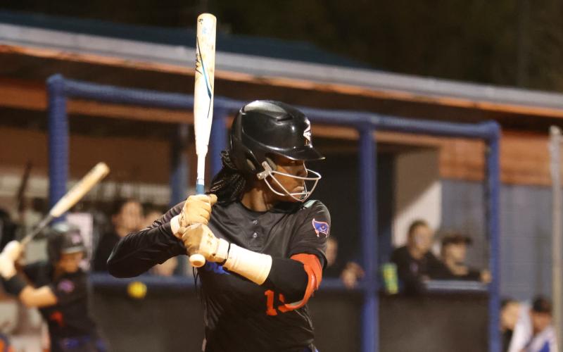 Branford's Mallory Blue gets set to hit a pitch against Suwannee on March 6. (PAUL BUCHANAN/Special to the Reporter)