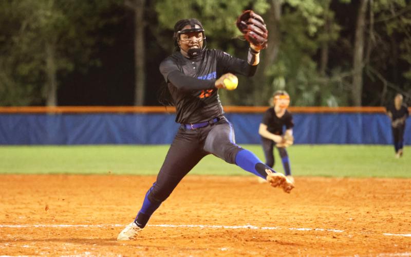 Branford pitcher Mallory Blue winds up to pitch against Suwannee on Wednesday. (PAUL BUCHANAN/Special to the Reporter)