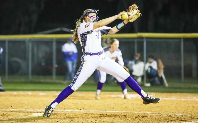 Columbia pitcher Harleigh Price winds up to pitch against Branford on Feb. 22. (BRENT KUYKENDALL/Lake City Reporter)