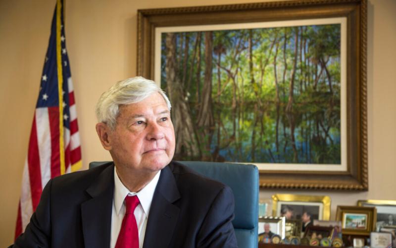 Former Governor and U.S. Senator Bob Graham, seen here in his Miami Lakes office in 2015, was famous for doing workdays alongside everyday Floridians and for obsessively taking notes about the ideas and thoughts people shared with him. (BENJAMIN RUSNAK/New York Times/TNS)