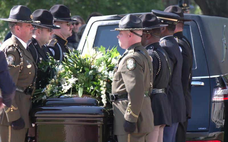 An honor guard carries the casket of former Gov. and U.S. Sen. Bob Graham. (NEWS SERVICE OF FLORIDA)