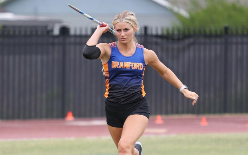 Branford's Jadyn Mosley performs the javelin during the District 5-1A meet on Saturday.
