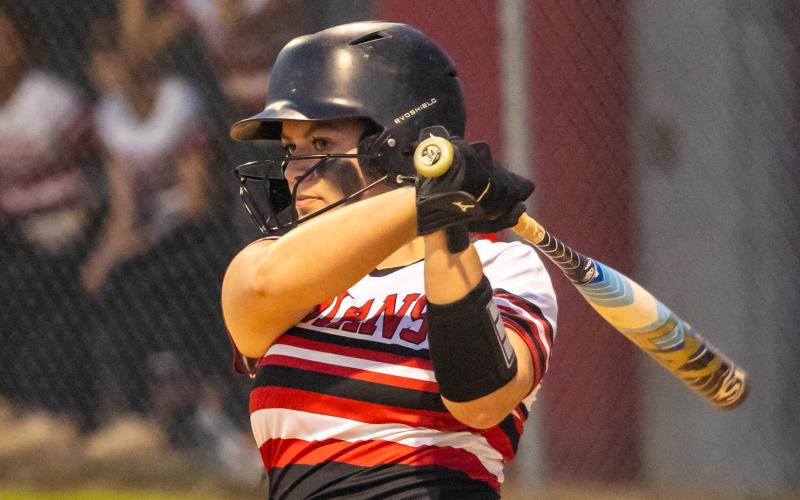 Fort White pitcher Kadence Compton hits a pitch against Lafayette on April 16. (JACK HOWDESHELL/Special to the Reporter)
