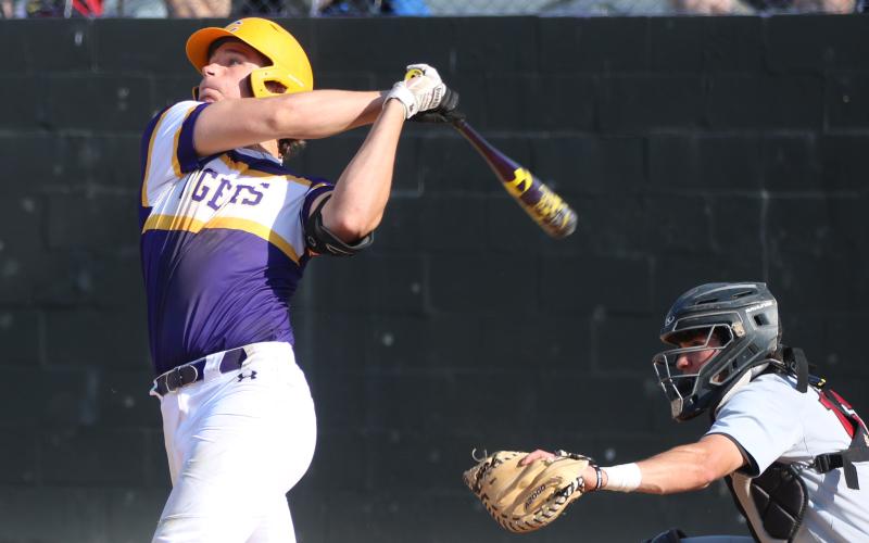 Columbia’s Ayden Phillips makes contact with a pitch against North Florida Christian on Tuesday. (JORDAN KROEGER/Lake City Reporter)