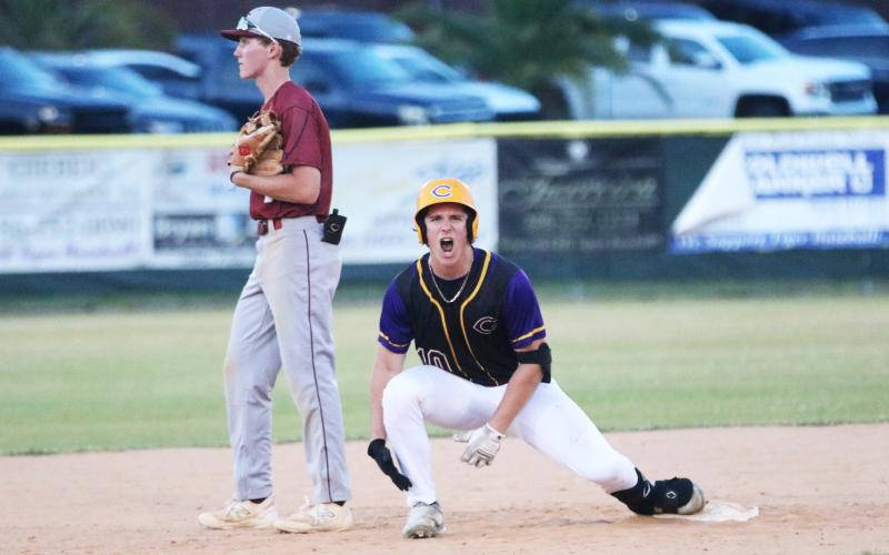 Columbia pitcher Ayden Phillips celebrates at second base after hitting a 2-RBI double against Chiles on Wednesday. (JORDAN KROEGER/Lake City Reporter)