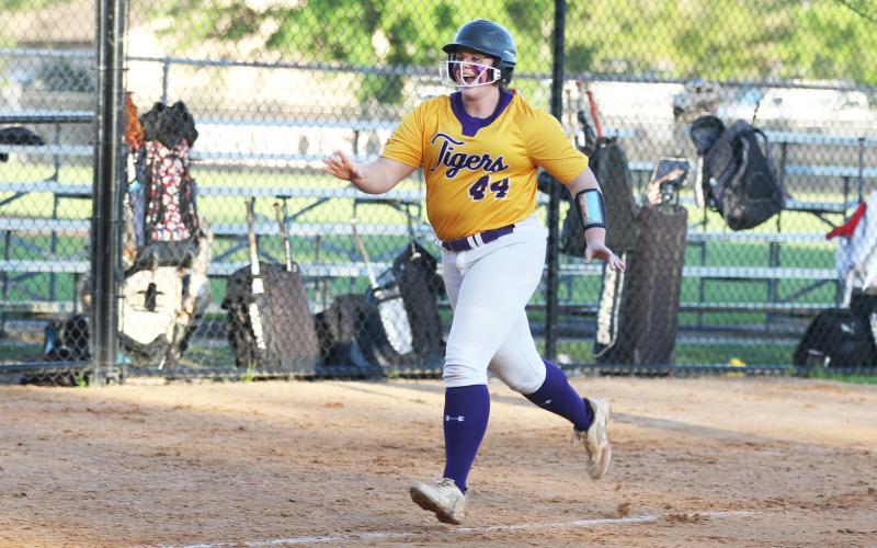 Columbia’s Josie Raulerson celebrates running toward home plate after hitting a home run against Middleburg on March 28. (MORGAN MCMULLEN/Lake City Reporter)