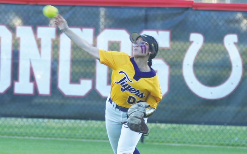 Columbia outfielder Luisa Taylor throws a ball back into the infield against Middleburg on Thursday. (MORGAN MCMULLEN/Lake City Reporter)