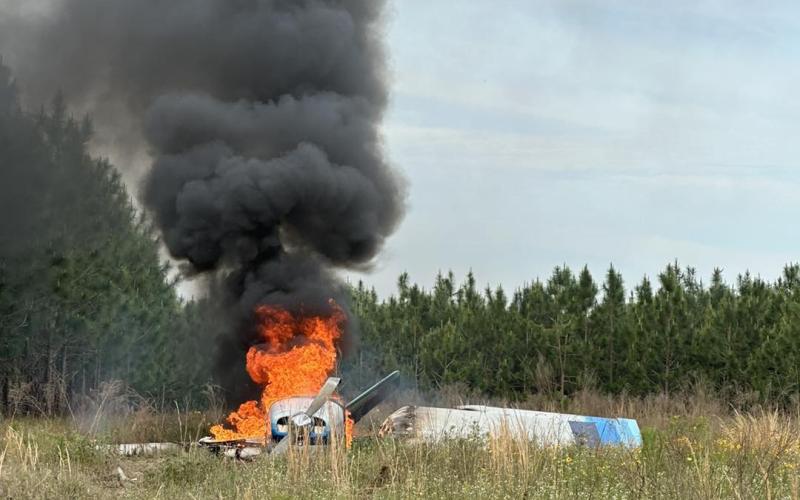 A plane is engulfed in flames after crashing during takeoff Saturday from the Little River Airstrip in McAlpin. Nobody was hurt in the crash. (COURTESY SUWANNEE COUNTY FIRE RESCUE)