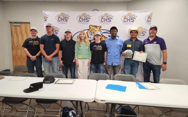 Columbia High welding students Richard Tyre (from left), Brett Jones, Chris Bolsten, Lane Milton, Benjamin Robinson and Amilcar Chavez received full scholarships to Big Bend Technical College. Pictured with them are Shelbi McCall (middle) from Big Bend Technical College and CHS welding instructor Darryl Thomas (right). (COURTESY)