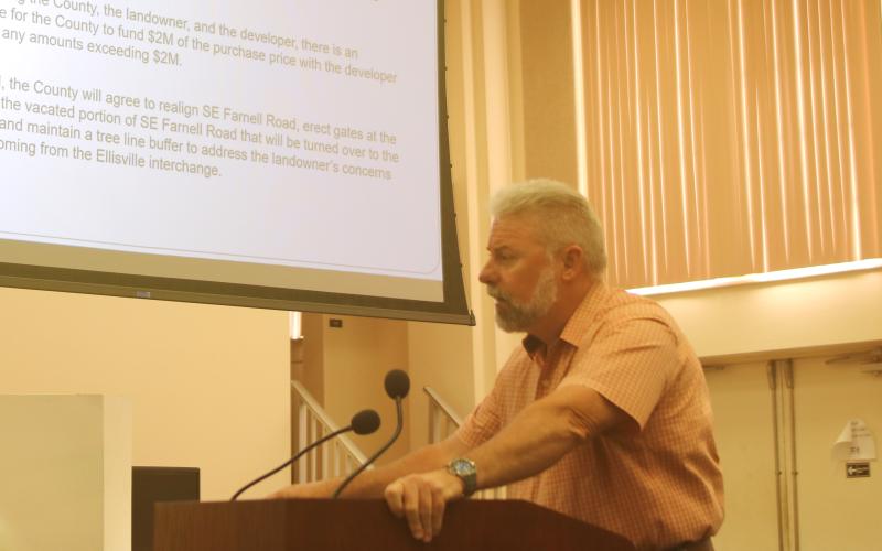 Assistant County Manager Kevin Kirby speaks during Thursday’s Columbia County Commission meeting on the need to relocate parts of SE Farnell Road to better accomadate growth in Ellisville. (TONY BRITT/Lake City Reporter)