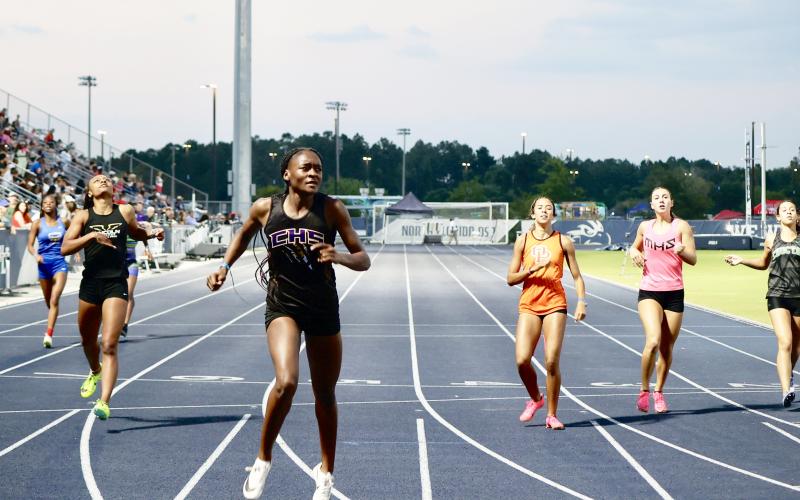 Columbia’s J’Liyn Smith leads the pack during the 400m at the Region 1-3A meet on Wednesday. Smith won the race in 58.06 seconds. (NANCY SCOTT/Special to the Reporter)