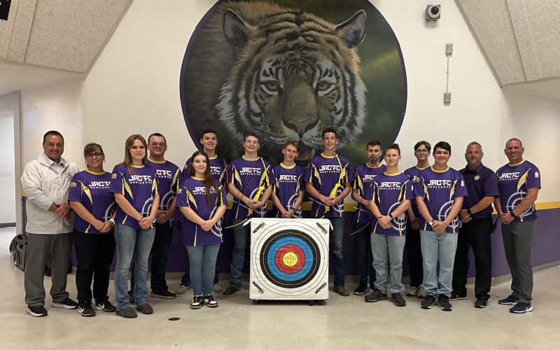 CHS Assistant Principal Mike Paphides (from left) and First Sergeant Trena Dettmer (Army Instructor), pose with Cadet Charli Lanfair (Team Captain), Cadet Kamden Spaziani, Cadet Ashley Mitchell, Cadet Chase Peisel, Cadet Justin Cranford, Cadet Timothy Bird, Cadet Wyatt Santos, Cadet Sigel Delsasso, Cadet Dakota Beichner, Cadet Elijah Deese, Cadet Caden Vreatt, CHS Principal Trey Hosford and Lieutenant Colonel Austin Akers (Senior Army Instructor). Not pictured is Cadet Joseph Hassett. (COURTESY)