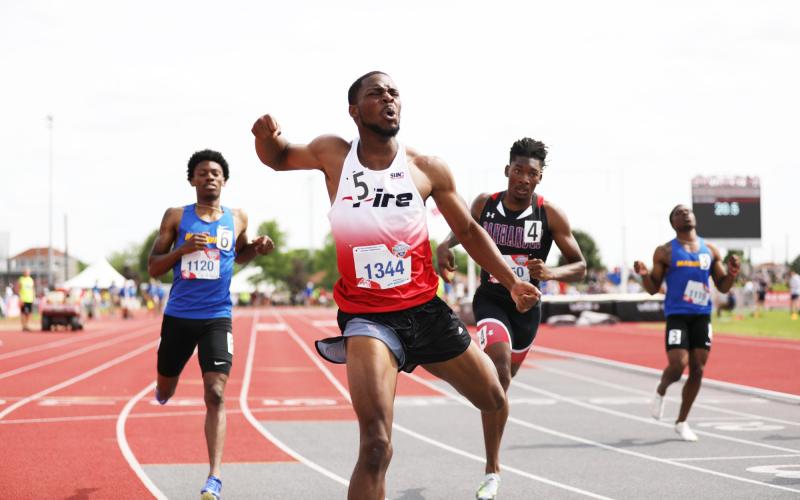 Southeastern’s James Williamson celebrates as he crosses the finish line to win the 200m NAIA title on May 24. (Courtesy of Southeastern)